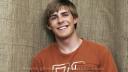 Chris Lowell as Dell Parker