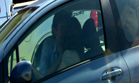 Jim and Pam kissing in car